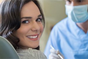 The woman is ready for tooth extraction.